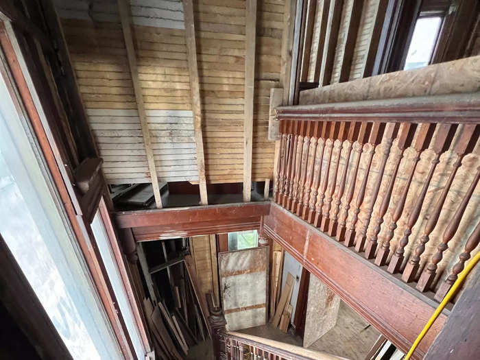 A wood staircase in an old home.