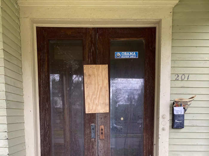 The front porch of an abandoned home.