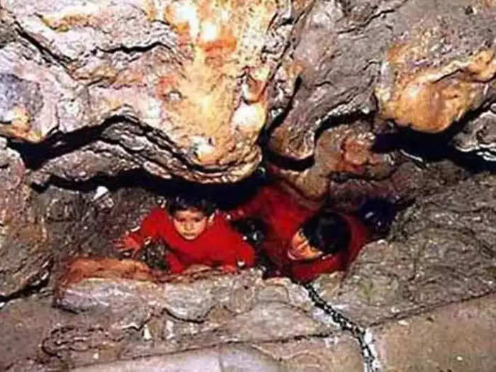 Explore the Ardhkuwari Cave