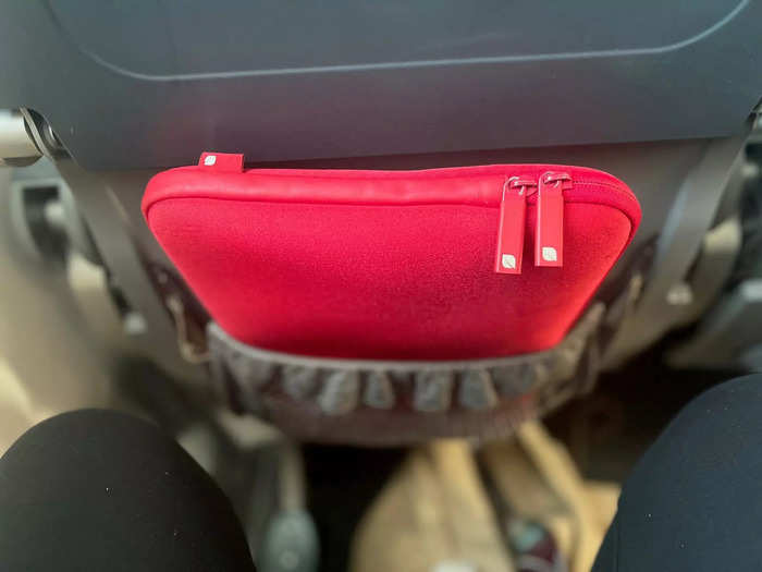 …a seat back pocket big enough for my laptop…