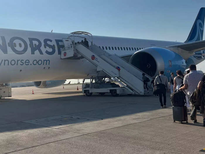 I was on the first bus to head to the plane, a decision I regretted. We ended up standing in the tight space for 30 minutes before being let off, so maybe take your time boarding.