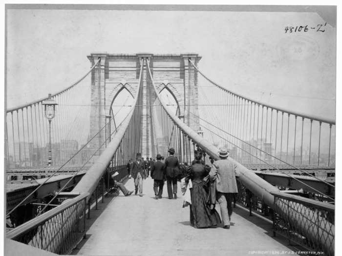 The bridge was completed with an elevated railway and pedestrian walkway.