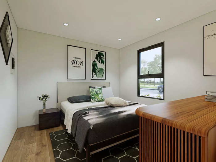 This is one of the bedrooms in the unit. The floors are made with wood plastic composite fiberboard.