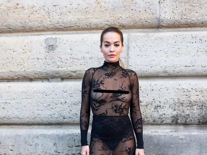 Rita Ora helped kick off Paris Haute Couture Fashion Week in a lace dress worn with almost nothing underneath.