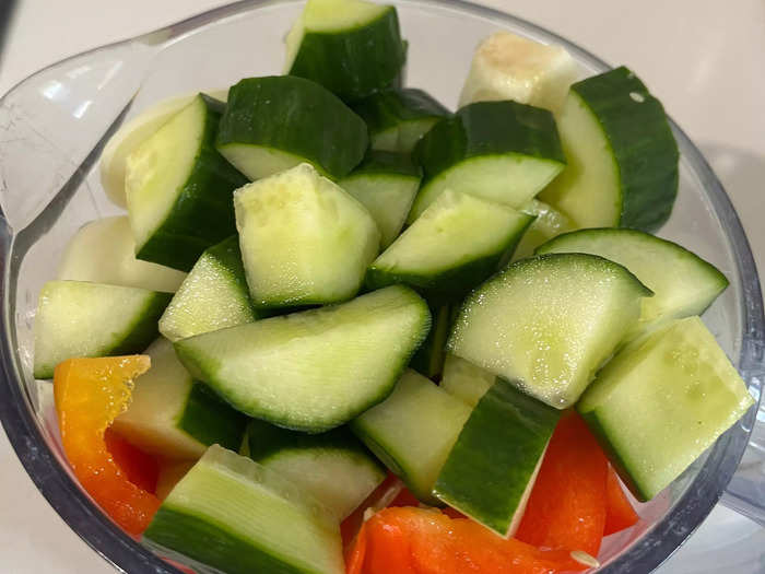 I chopped half of a cucumber and put it in a blender. The key to the dish is having high-quality ingredients, so I tried to source the best vegetables I could find.