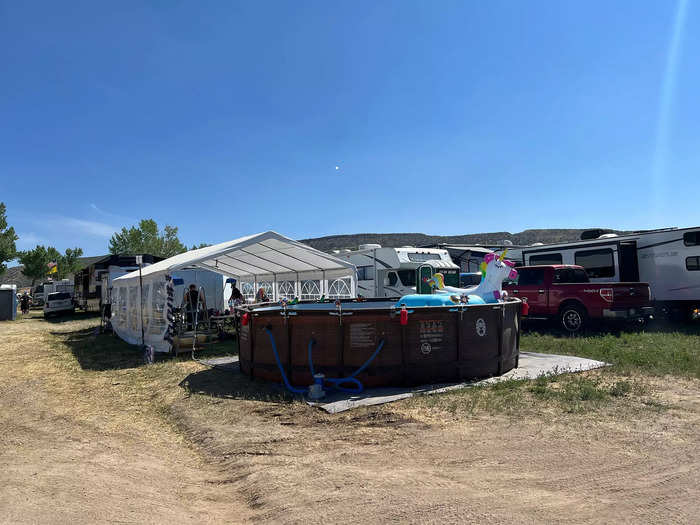 We spent $422 for four nights of camping in a hayfield close to the concert venue.