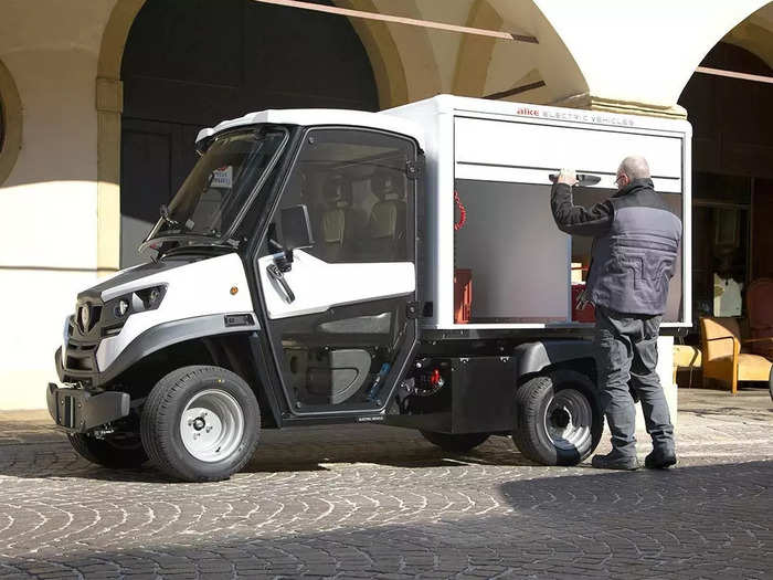 Alké, an Italian EV company, manufactures a variety of utility vehicles. Its cargo van with rolling shutters is made for urban environments. The vehicle is capable of carrying loads as heavy as 3,300 lbs. The standard version measures 11.5 feet in length, 4.5 feet in width, and 6.5 feet in height. These electric cargo vans are marketed to hospitals, resorts, and catering companies, rather than the standard consumer.