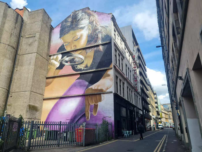 My journey began on Mitchell Street in the city center. This colorful mural on the back of a building depicts a girl with a magnifying glass.