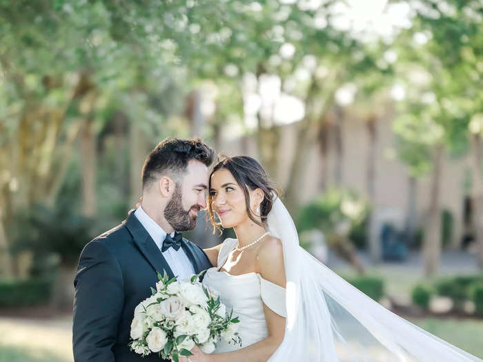 Emily paired the designer gown with an affordable veil.