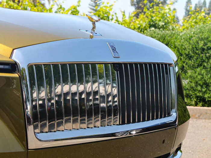 At a glance, the EV has all the markers Rolls is famous for: A flashy grille, a swept-back silhouette, center caps that prominently display the Rolls-Royce logo, right-side up, even when the car is in motion.