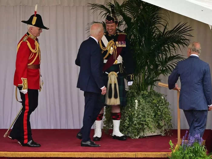 As they departed the ceremony, Biden shared a joke with Charles