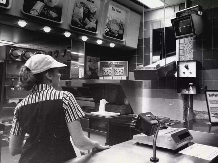 Employees wore striped bowling-style shirts and hats.