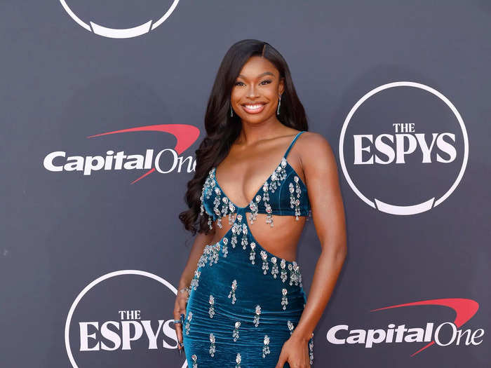 Singer Coco Jones walked the red carpet in a PatBO gown covered in crystals.