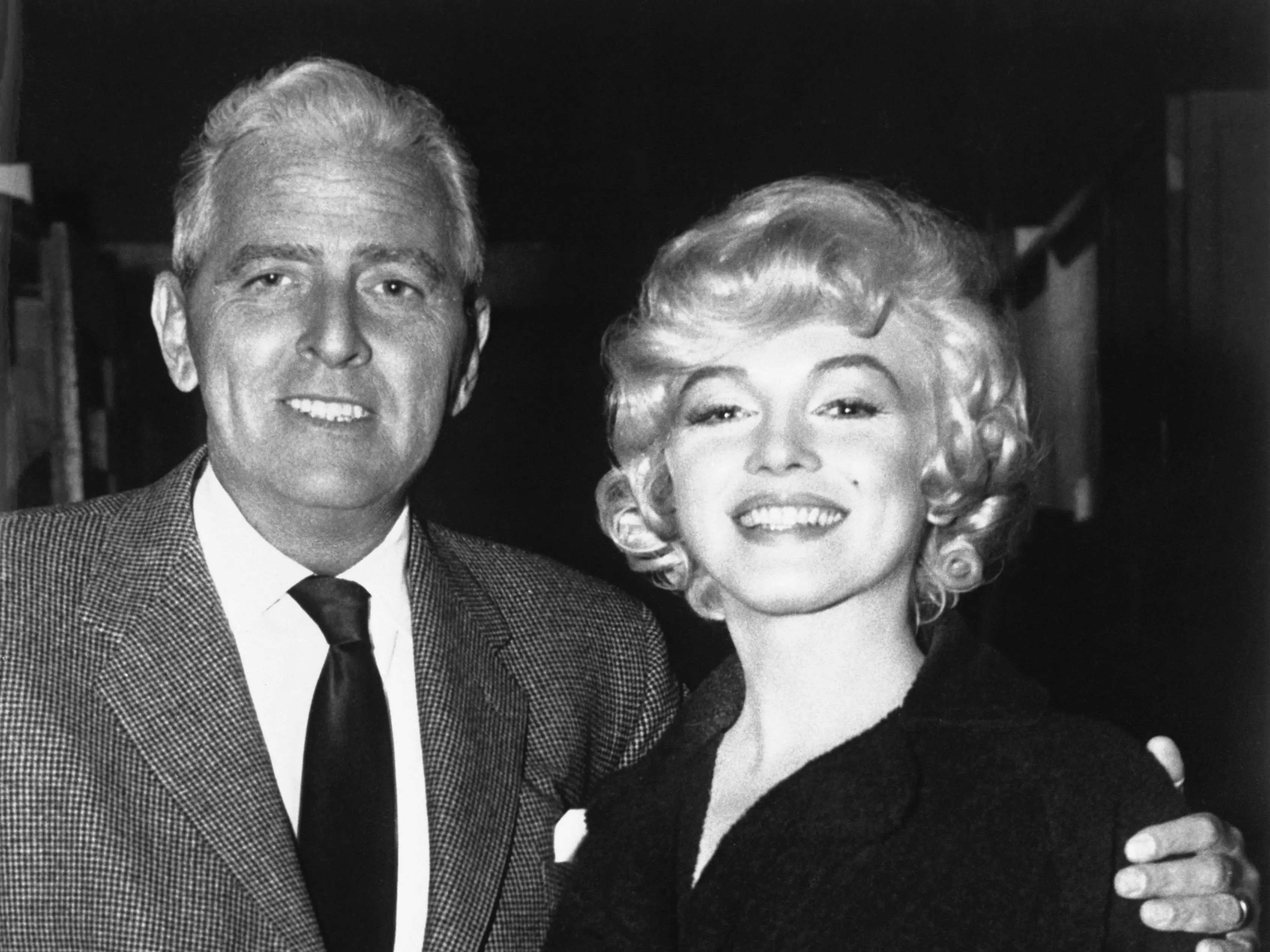 Producer Buddy Adler and Marilyn Monroe black and white shot