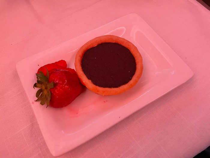 Arguably the best part of both meals was the dessert. In business, I dined on a rich chocolate tart served with a strawberry garnish.