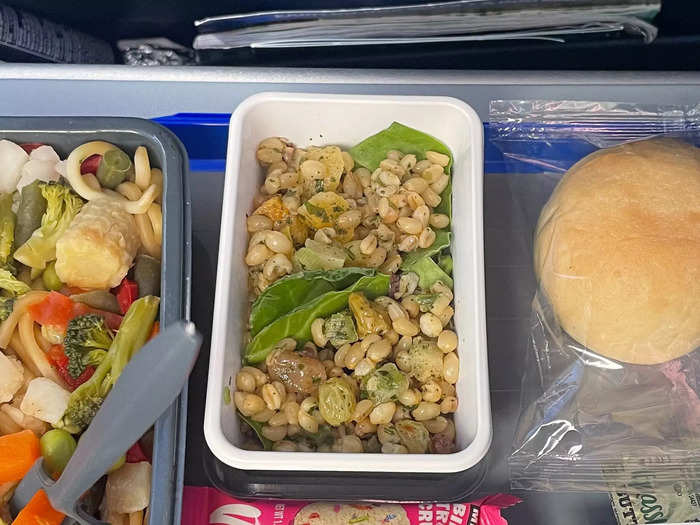 And in economy, I had a salad with grains, raisins, and lettuce.