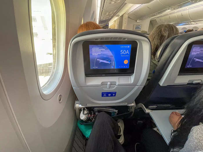 In economy, flight attendants shared the main course offerings as they arrived with the meal cart at my seat.