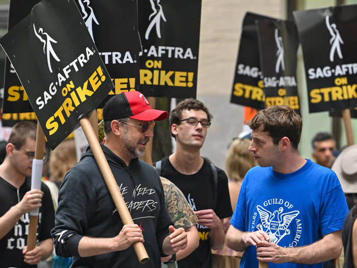 Sudeikis, holding a SAG-AFTRA strike sign, was also joined by stand-up comedian Alex Edelman.