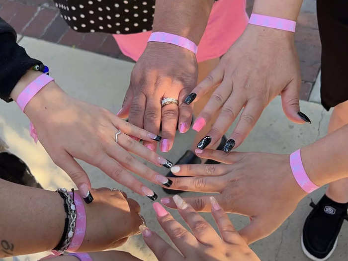 People entered the store in small groups and some early attendees received special wristbands.