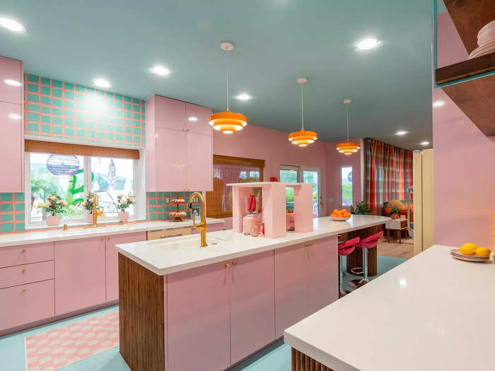 Roth and Lofaso added retro chandeliers, bringing more light to the room. The counter also featured secret shelves that rose up with the push of a button, revealing Barbie