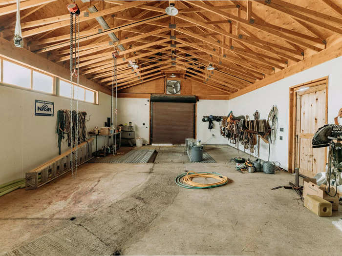 There is a tack room, an indoor riding arena, and two houses for ranch hands nearby the riding range, according to a map of the property.