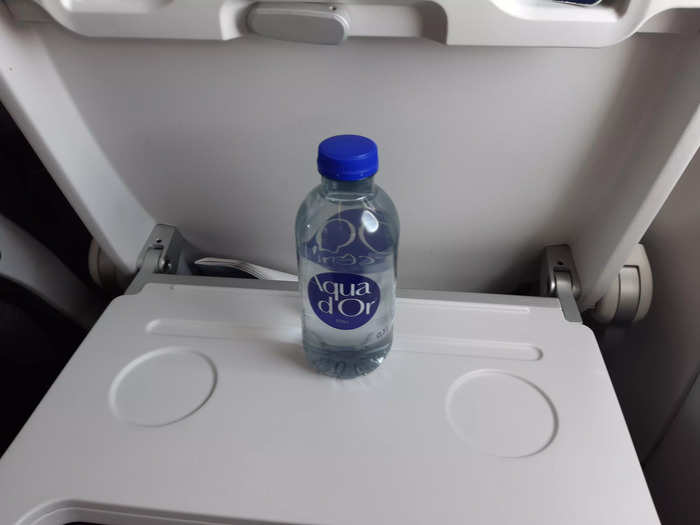 Shortly after takeoff, passengers in economy were given a complimentary bottle of water. Other beverages and snacks were for sale.