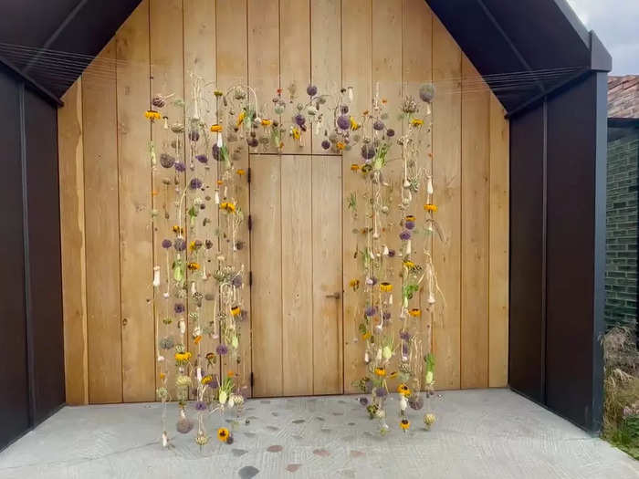 We entered the restaurant through garlands of vegetables, plants, and flowers.