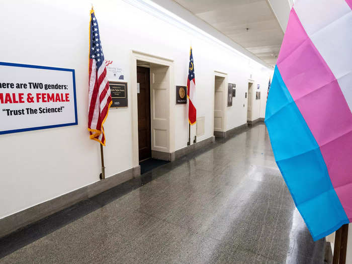 7. Hanging an anti-trans sign outside her office