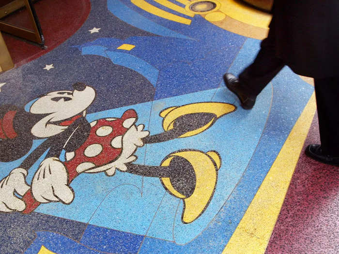 Mosaic and tile floors depicting classic Disney characters greeted shoppers as they entered.