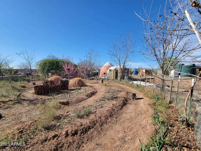 Gibbons made other improvements to the property, like two outhouses and a large garden with an orchard of fruit and nut trees.