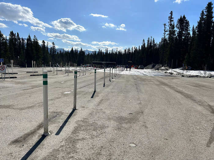 We passed many empty spaces where it looked like shuttles should be. Shuttles are popular during peak season because Lake Louise, and especially its parking lot, can get crowded. On our trip, we only saw one.