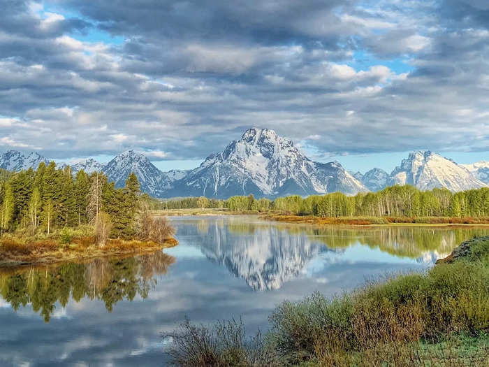 Hike designated trails and view wildlife from a distance in Jackson Hole, Wyoming.