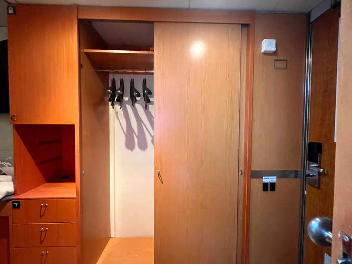 It had two twin-size beds, two retractable bunk beds, a desk, a wet bar, and storage galore, including two closets and two bureaus.