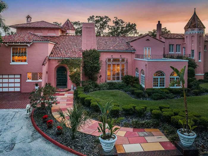 While Barbiecore usually features bubblegum pink, there are some homes on the market for more understated fans of the trend, like this house in St. Petersburg, Florida.