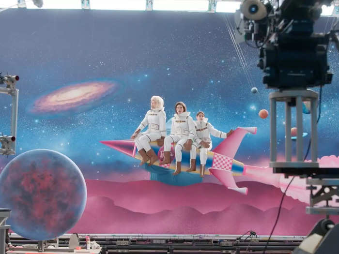 Similar to the driving scene, crew members operated conveyor belts with scenery on them for Barbie