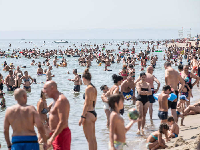 Elsewhere in Italy, tourists by the thousands were photographed flocking to beaches in a bid to escape the heat.