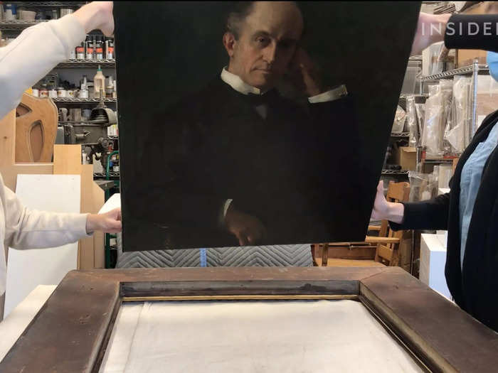 With the painting and the frame restored, the two can be combined again for the final product.