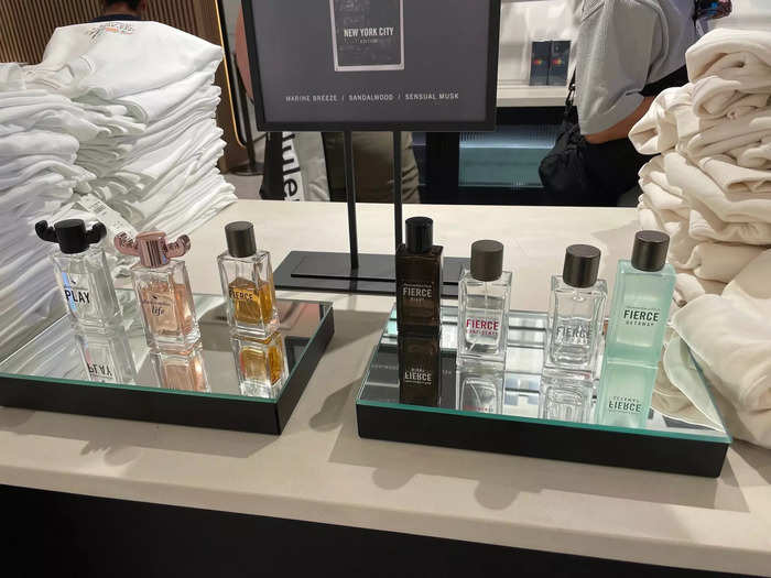 Mirrored trays displayed two moose-eared fragrance bottles and five variations of Abercrombie