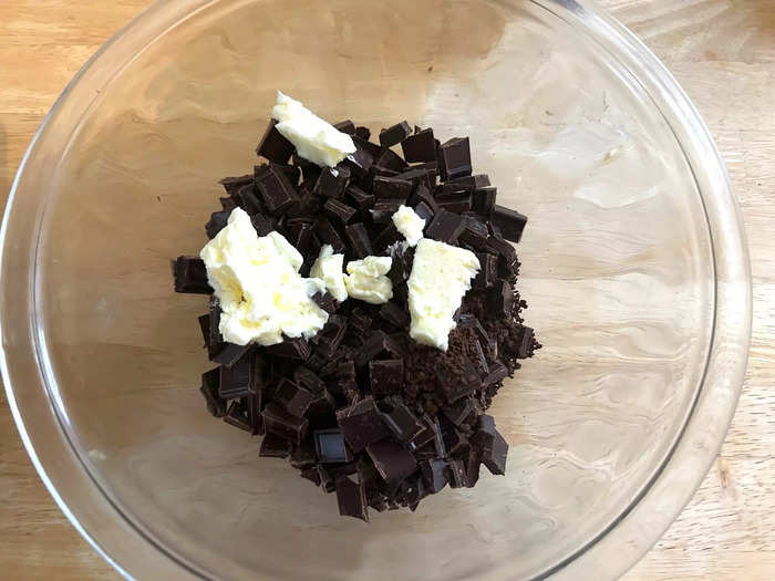 Then I placed the chocolate in a bowl with the butter and espresso powder.