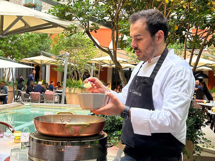 Chef Oliver Piras cooked and served me a pasta dish at my table on the patio as part of my dinner at the restaurant.