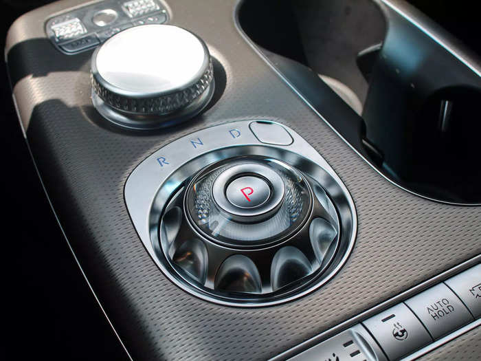 But when you switch the car on, it rotates 180 degrees to reveal your gear selector.