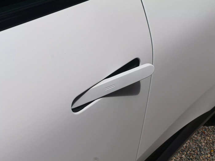 Adding to the sleekness are flush door handles that pop out when the car is unlocked, or fold flat when driving.