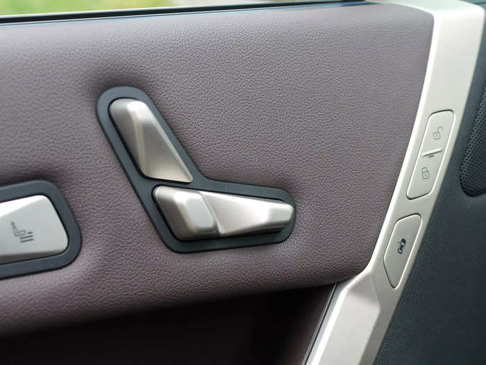 Practically everything is covered in beautiful leather, from the door panels ...