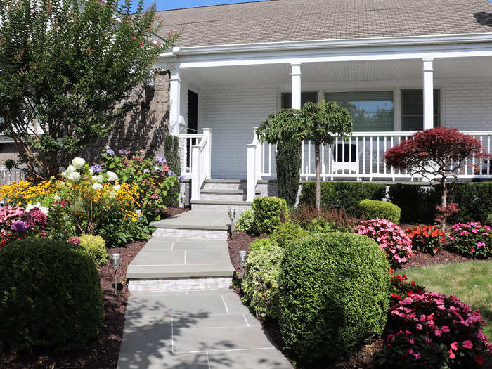 Others featured eye-catching landscaping with walkways of colorful flowers.