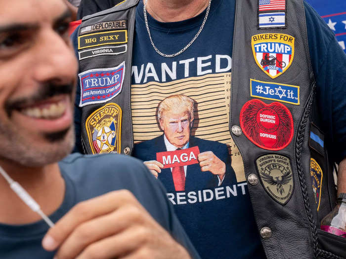 A demonstrator wore various MAGA merchandise. Trump