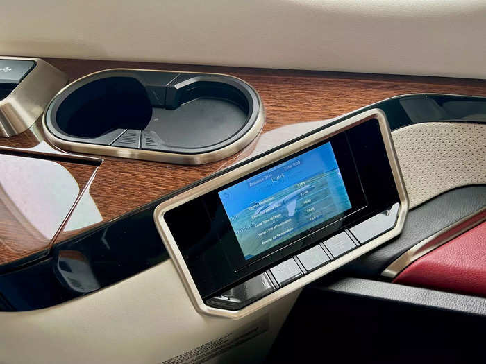 The touchscreen control system is typical on private jets and can be used to manage things like temperature and light, as well as display flight information.