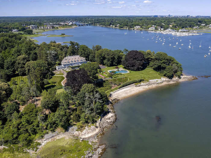 The waterfront estate is located on a private peninsula on the Long Island Sound. It has two private beaches...