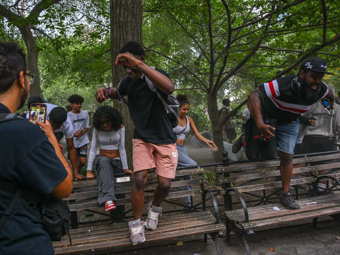 As the event became disruptive, people were photographed climbing over benches to leave Union Square Park.