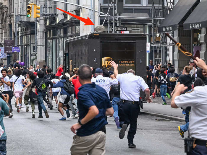 One attendee appeared to throw a plate at NYPD officers as they tried to clear the crowd at Union Square Park.