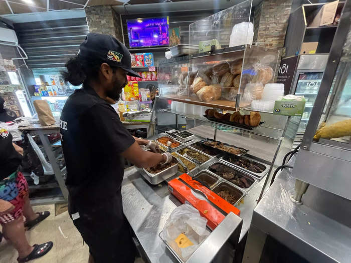 The 31-year-old owner works alongside his sister to make sandwiches while his father preps food. It was truly a family affair.